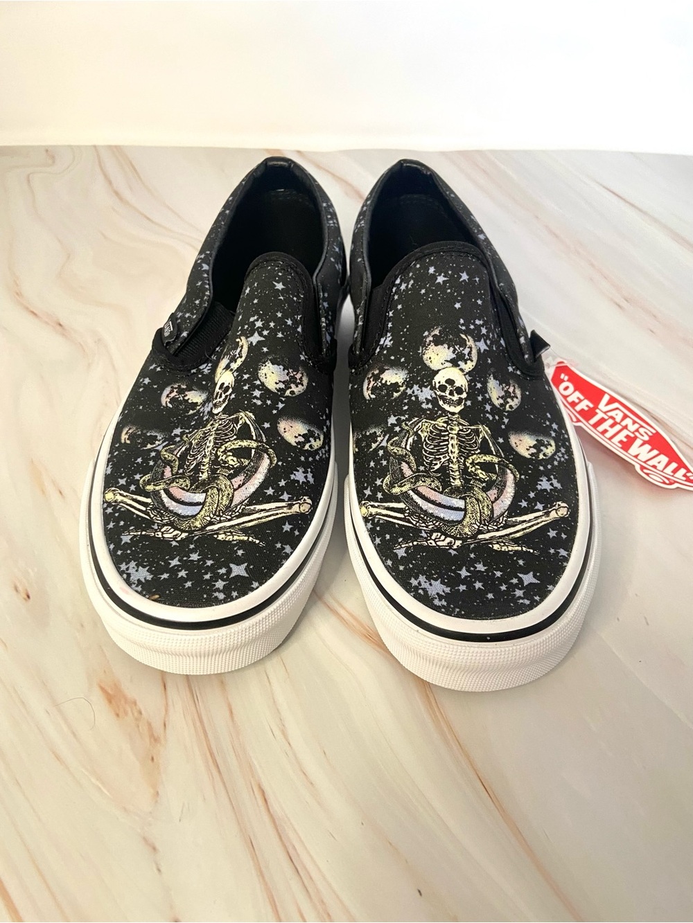 Vans Kids Black Slip-On Sneakers with Skeleton Graphic